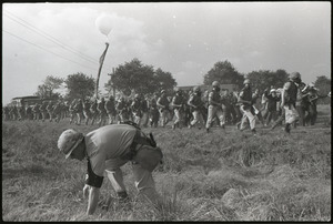 Antiwar demonstration at Fort Dix, N.J.: military police with gas masks deploying against protesters