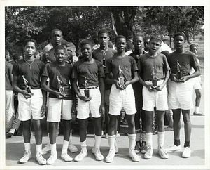 Boys holding trophies