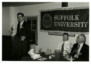Athletics Director James E. Nelson speaking at Suffolk University's athletics banquet, 1994