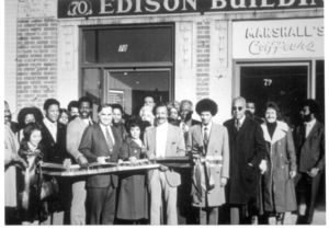 John Joseph Moakley at a ribbon cutting ceremony in an African American community, 1970s