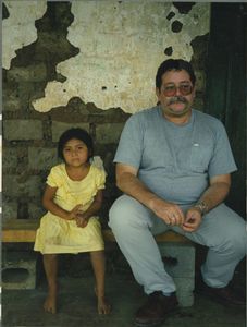 Leonel Gomez and young girl in El Salvador, May 1990