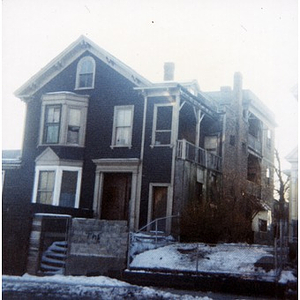 Exterior view of a dark blue house with white trim, Roxbury, Mass.