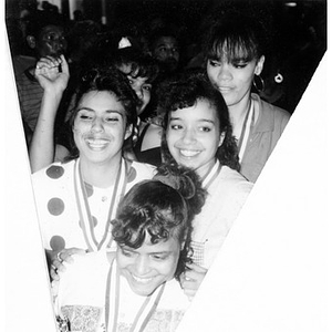 Portrait of teenage girls wearing medals around their necks.