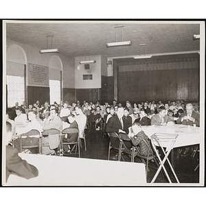 Guests seated at tables in an auditorium at a Boys' Clubs of Boston Awards Night