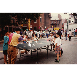 Ping-pong game during the Recreation Day fair