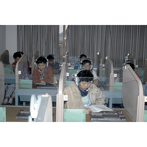 Students reading in a language lab