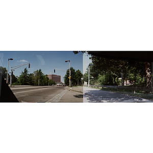 Panoramic view of a sidewalk and an empty intersection