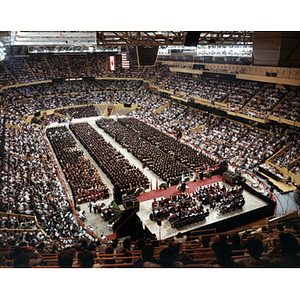 Aerial view of the graduates and audience from the morning commencement ceremony at the Boston Garden