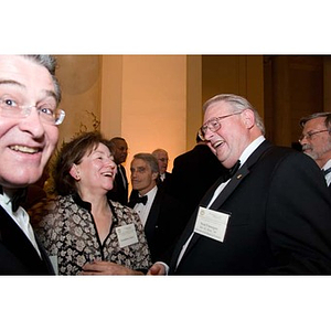 Neal Finnegan laughs among guests at the inauguration celebration of President Aoun