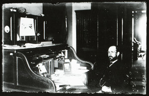 Portrait of old time R.R. officer, seated, facing left, location unknown, ca. 1900
