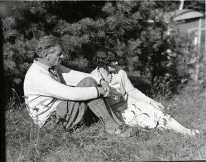 George Allan England and wife Blanche, seated beneath pines