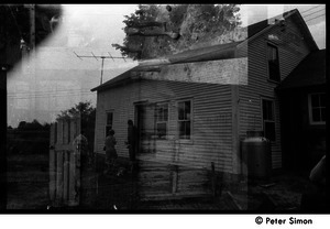 Double exposure of house at Packer Corners commune