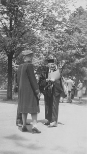 William L. Machmer standing with two people while in academic robes