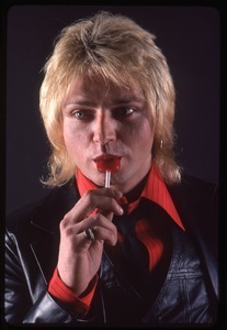 The Cars, photo shoot for Candy-O: Benjamin Orr sucking on a lollipop