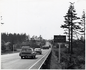 Automobiles driving into Newport, Oregon