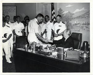 Mayor John Collins with military personnel