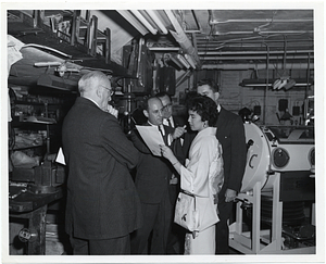 An unidentified woman reading a statement with Mark Bortman