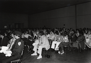 Group of unidentified community members and public safety officers at a meeting