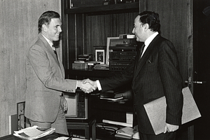 Mayor Raymond L. Flynn and an unidentified man