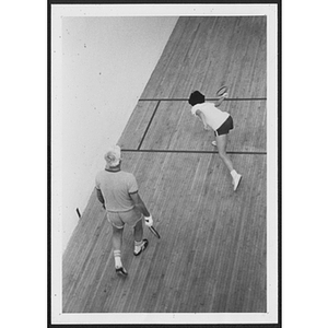 Two players in a game of racquetball