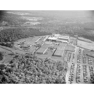 Suburban location of industrial buildings, some new construction, unidentified