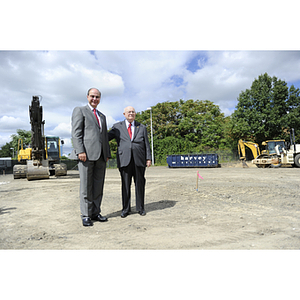 President Joseph E. Aoun and Dr. George J. Kostas stand on the construction site of the George J. Kostas Research Institute for Homeland Security