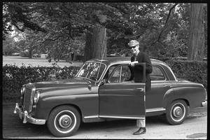 Jim Rooney next to a Mercedes courtesy car, Newport Jazz Festival