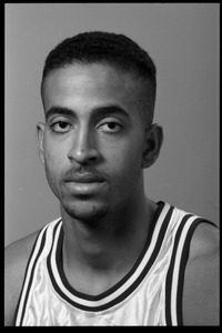 Carmelo Travieso: studio portrait of sophomore guard with UMass Amherst basketball team