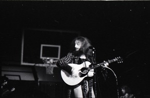 Jethro Tull in concert at the Springfield Civic Center: Ian Anderson playing acoustic guitar