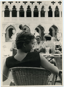 Pat Spaulding seated at a cafe in Venice