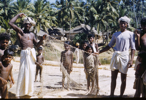 Men show off their fishing net