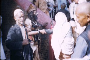 Priest begging near the Gokarna Mahadev temple