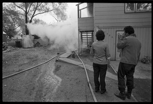 Man in anguish after learning that his garage was gutted by fire, and the family's cat was trapped inside