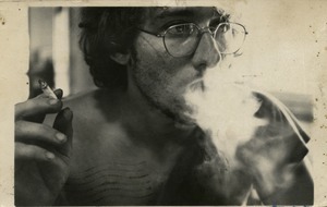 Chuck Light, portrait while smoking, Montague Farm Commune