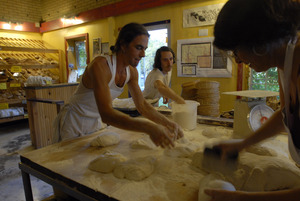 Hungry Ghost Bread: owner and baker Jonathan C. Stevens and crew preparing bread dough