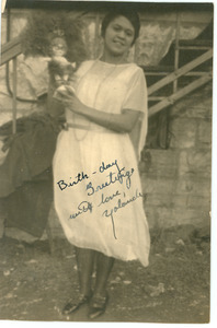 Yolande Du Bois in Fisk University jubilee dress holding doll