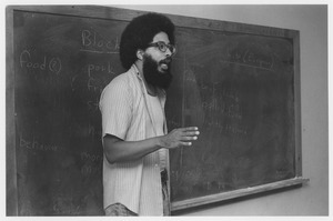 John H. Bracey, Jr. speaking indoors