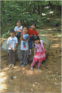 A photograph of Karen children in Millennium Park, 2013