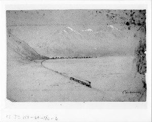 Railroad Train and Town Seen at a Distance