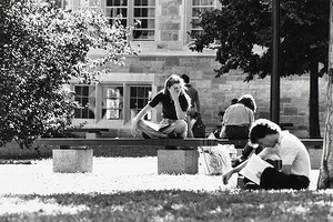Students studying outdoors at Boston College