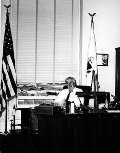 Thomas P. O'Neill sitting at desk in congressional office