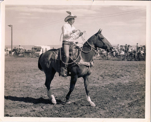 Dad preparing to rope a calf