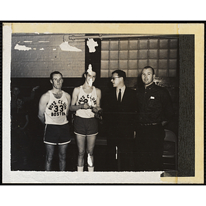 Richard B. K. McLanathan presents a trophy to the Boys' Clubs of Boston basketball team