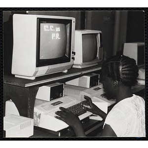 A girl uses a computer in a lab