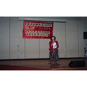 Suzanne Lee speaks at the Chinese Progressive Association's China Flood Fundraiser