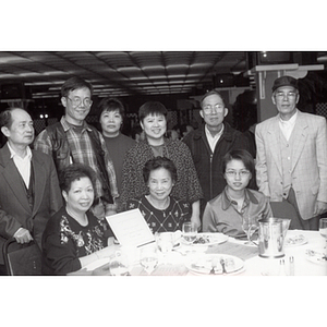 Lydia Lowe, Henry Wong, and other Chinese Progressive Association members at an awards banquet