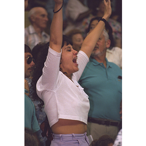 Woman cheering at commencement