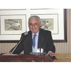 John Hatsopoulos addressing audience at a gala dinner in his honor