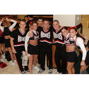 Husky cheerleaders pose before the homecoming parade