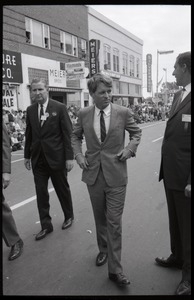 Robert F. Kennedy standing in the street in Worthington, Minn., during the Turkey Day festivities